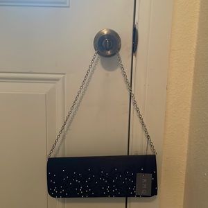 Clutch/purse- black evening bag with silver chain strap. New with tags